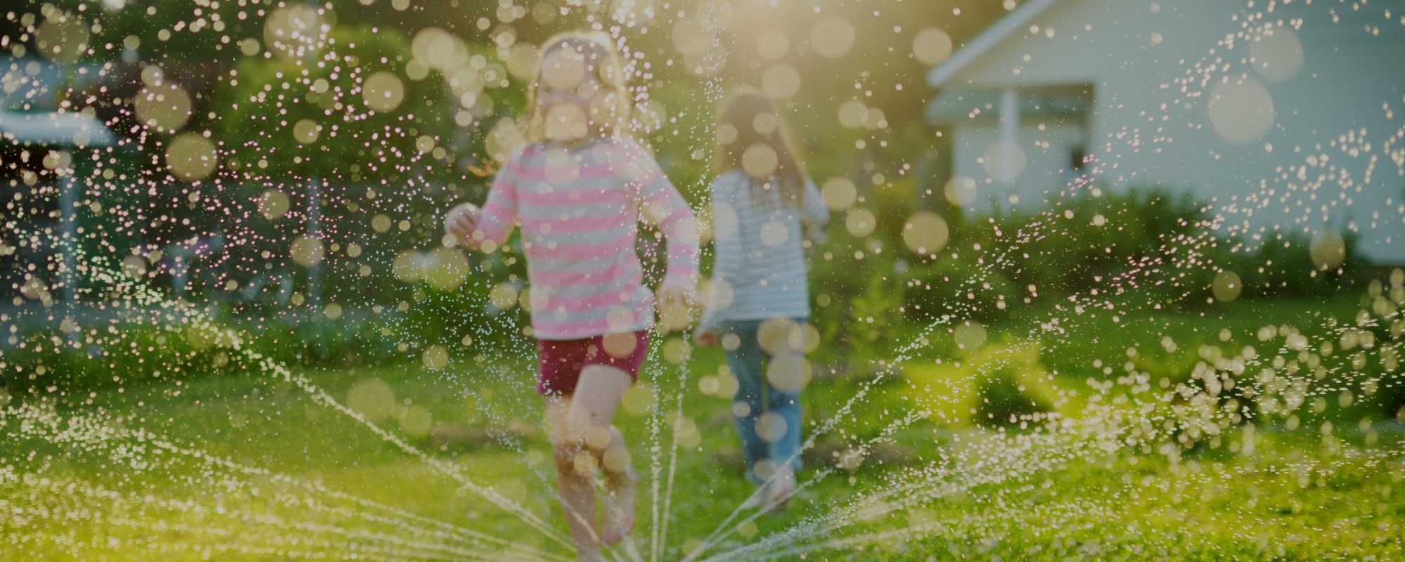 kids in sprinkler